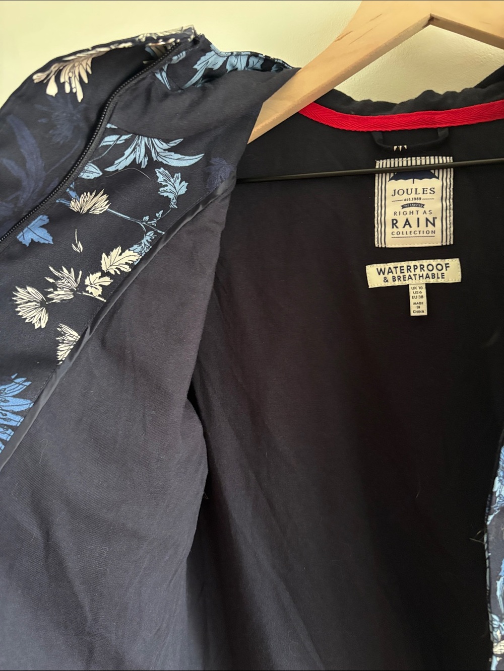 Joules • Navy Hooded Rain Jacket with Blue & White Floral Print - Picture 6 of 8